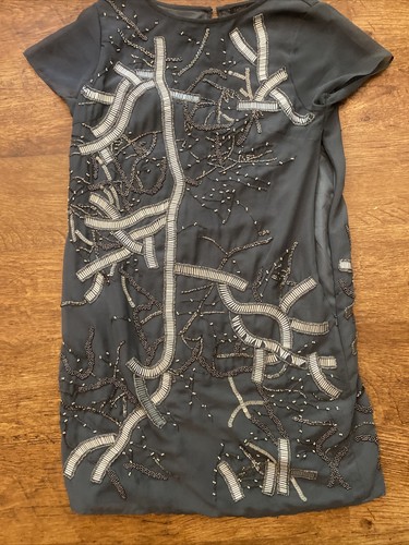 Label lab heavily - beaded, grey